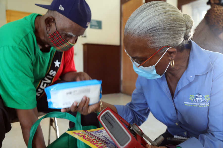 Lucinda Millin Residents Get CARE Packages With Red Cross Radios